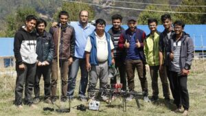 A team of Nepali engineers pose for a picture along with the medical drone used to supply medicines in remote villages in Myagdi, Nepal April 9, 2018.